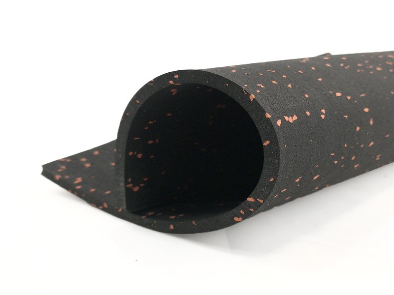 A perfectly packed shipping container with rolls of gym flooring secured for transit